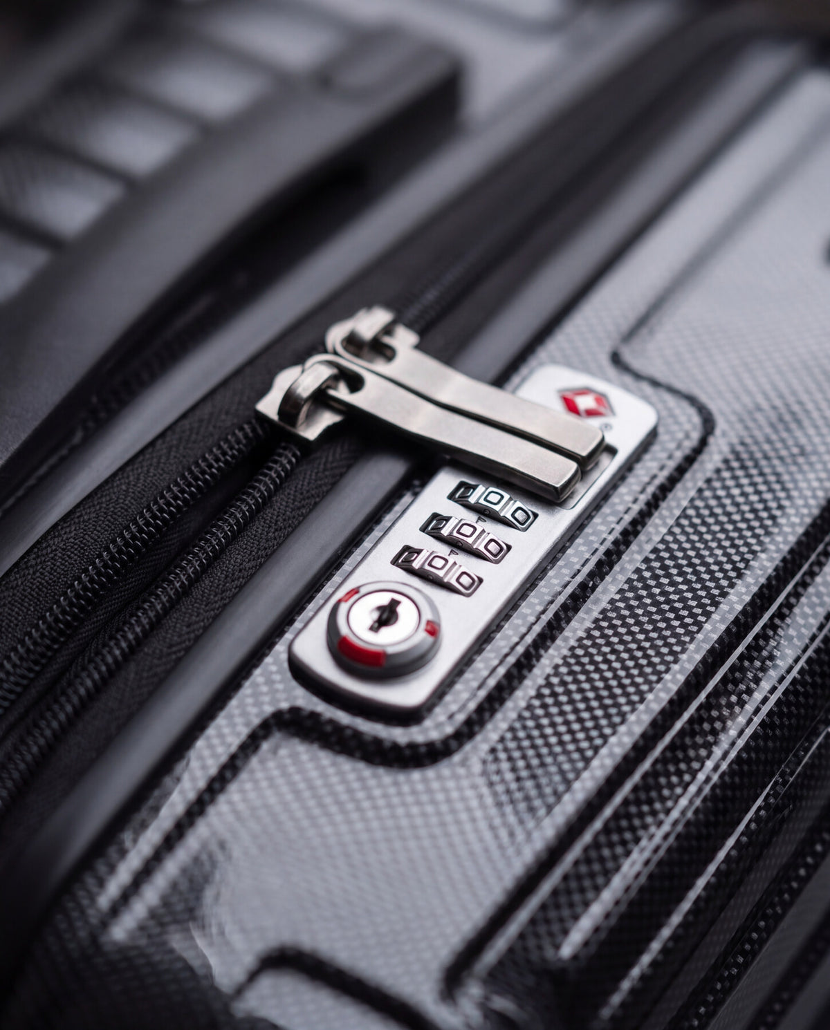 Close-up of the integrated TSA combination lock
